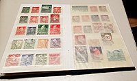 bestückte Alben und internationale Briefmarken